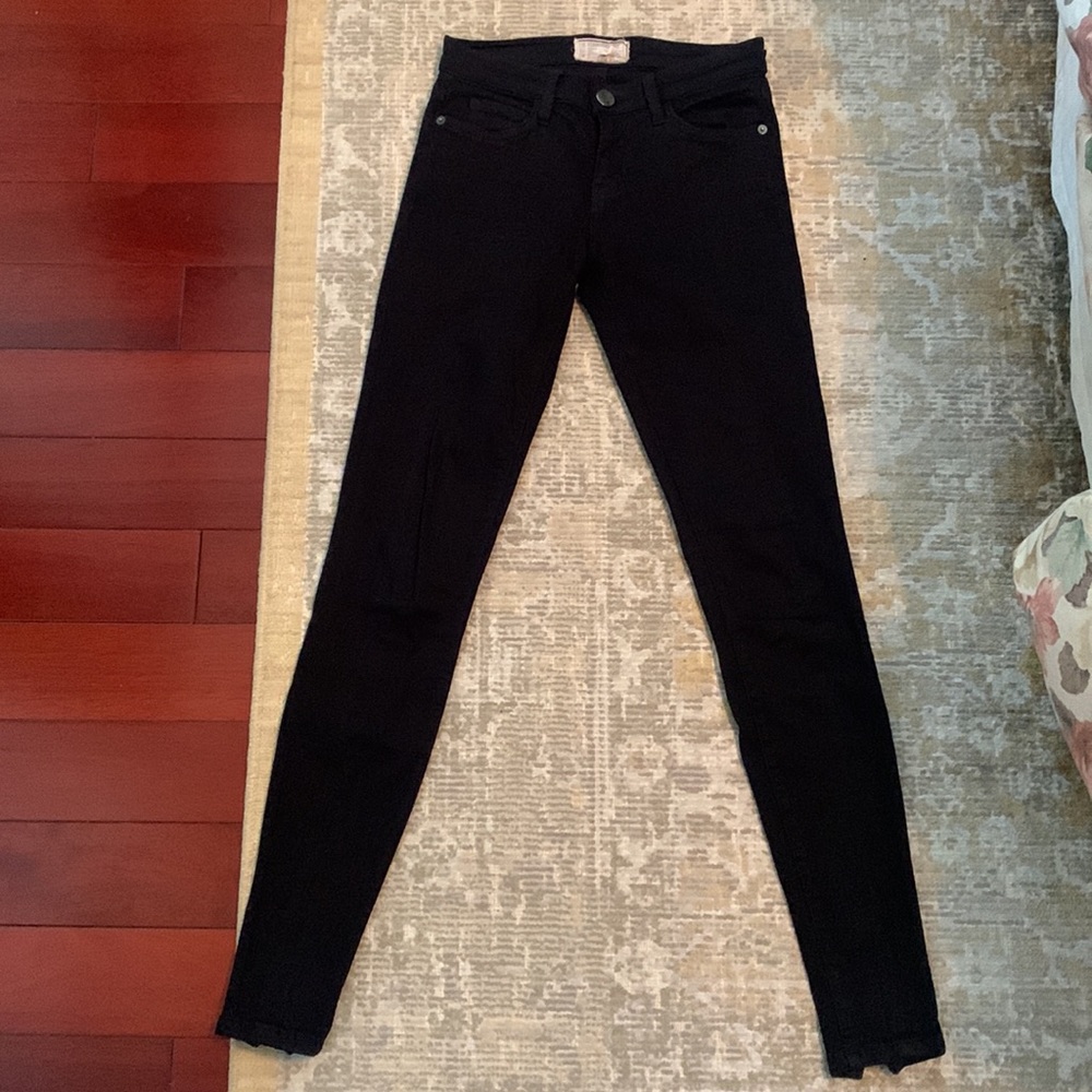 Black stretch denim jeans. Low rise. Back ankle zip